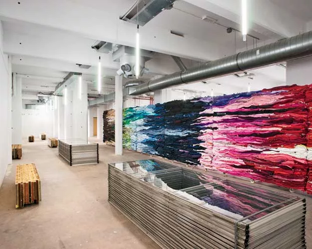 This office is on the ground floor of a 1930s harbor storage and distribution facility in Rotterdam, which stood empty for decades. The facility is now being repurposed as an incubator for startups de
