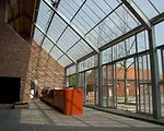 Doepel Strijkers converted former farm buildings in Meer, Belgium, into a compound for a furniture designer and artist. The new complex includes a residence, showroom, theater, guest lodging, and a ba