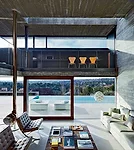 The building comprises two residences, one for Carnicero himself and the other for a friend, as well as the architect's studio. The house, outside of Madrid in Torrelodones, is raised on an ample podi