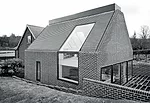 In adding to a simple house in Strathblane, Scotland, Lee and Pert followed the pattern of local farms that expand by erecting new buildings wherever they are needed. The architects echoed the form of