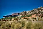 Since End'mico (previous slide) opened last winter, a 19,375-square-foot winery has been completed at the bottom of the hill. The steel-and-glass rectilinear structure, which provides wine tastings to