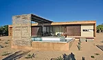 With two vacation cottages completed in 2006 (one for the client, the second to rent), Gracia staggered the one-story structures on the 50,000-square-foot desert site so each would have expansive view