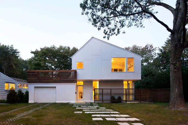 SsD sought to build an alternative to the typical single-family residence with their Braver House, placing PV panels on the canted roof.