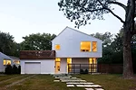 SsD sought to build an alternative to the typical single-family residence with their Braver House, placing PV panels on the canted roof.
