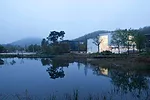 The 16,145-square-foot White Block Gallery sits in the trendy Heyri Arts Valley in South Korea. Because its site borders North Korea and is in a no-fly zone, SsD tackled restrictions to the building's