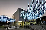 Commissioned for a courtyard at the White Block Gallery, this work takes its name from the shape of the three loosely organized clusters of LED-lit plexi-rods, supported by a steel-and-aluminum frame,