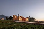 TAO designed this museum in Yunnan province as a cluster of volumes, echoing the ad hoc pattern of buildings in the adjacent village of Gaoligong. The museum's timber-framed buildings use nail-free su