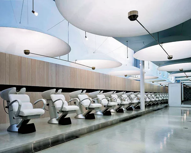 The project that launched Nagayama's career, Afloat-f is a two-story hair and nail salon located in Tokyo's Omotesando neighborhood. Illuminated from below by halogen lamps, aluminum satellite dishes