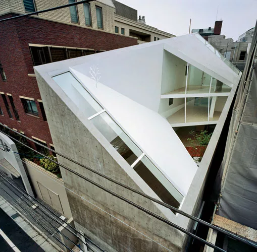 Faced with a commission to design a house for a family of four on a long, narrow site in a densely built neighborhood in central Tokyo, Nagayama had to figure out how to bring daylight inside without