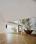 Faced with a commission to design a house for a family of four on a long, narrow site in a densely built neighborhood in central Tokyo, Nagayama had to figure out how to bring daylight inside without 