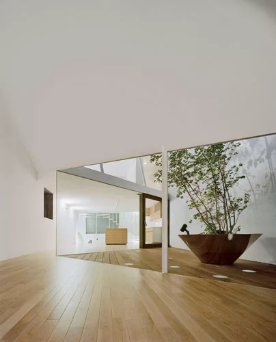 Faced with a commission to design a house for a family of four on a long, narrow site in a densely built neighborhood in central Tokyo, Nagayama had to figure out how to bring daylight inside without