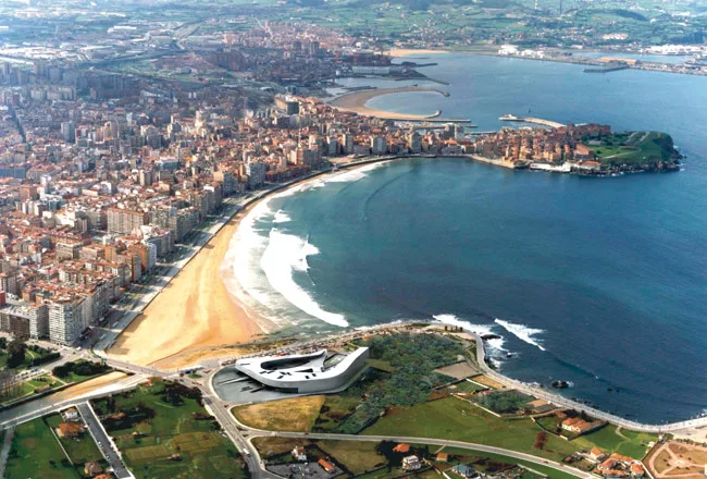 The spiral form of the salt-water spa and hotel creates a rising seaside promenade, lifting strollers to views of the city while creating a more protected realm for bathers inside. Architect Francisco