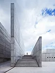This park, designed with Manuel Fern'ndez Ram'rez, sits along a ring road on the outskirts of Zaragoza and serves as a gateway to an adjacent residential neighborhood. A sunken plaza serves as one of 