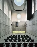 This intervention occupies the basement of a Neoclassical loggia in Madrid. Collaborating with Jes&uacute;s Aparicio, Elorza removed a portion of a thick floor slab to create a double-height auditoriu