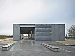 At this windowless facility in Madrid where scientists handle dangerous substances, narrow patios separate four labs, while a vehicular service corridor runs the length of the building. Elorza enclose