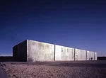 At this windowless facility in Madrid where scientists handle dangerous substances, narrow patios separate four labs, while a vehicular service corridor runs the length of the building. Elorza enclose