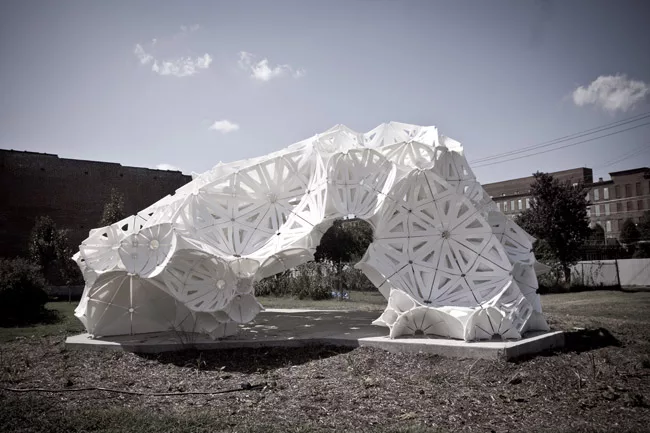 Plasti(k) is made of 150 4-by-8-foot sheets of polyethylene held together by more than 1,300 bolts. Washington University architecture students helped fabricate and assemble the piece, which was insta