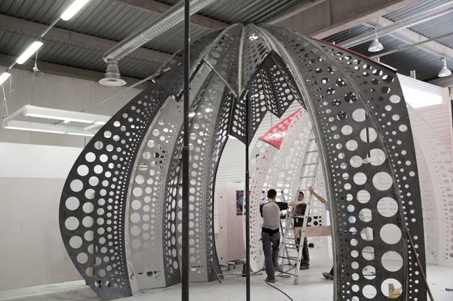 Fornes helped Japanese artist Yayoi Kusama and Louis Vuitton create a pop-up store that was installed at Selfridges in London during the late summer and fall of 2012. Doubly curved V-shaped 'slices' o