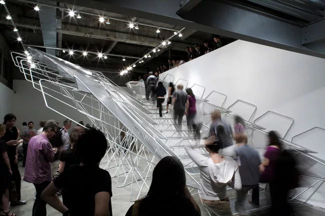 Call it the unstaircase—a not-to-code structure that lets people ascend from the ground level of SCI-Arc’s gallery in L.A. to a catwalk above. The skeletal form, designed with Buro Happold