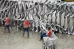 This 21-foot-long installation in Los Angeles, made of rope strung across steel framing, forms an optical illusion. Look at it straight on and you see a repeating, legible pattern. But move around it 