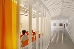 Para transformed the 4,500-square-foot ground floor of a four-story warehouse in west Syracuse, New York, into a Latino cultural center. Movable fabric curtains, rather than traditional walls, divide 