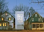 This 1,125-square-foot three-story building, which contains a garage, writing studio/library, and reading room at the top, is wrapped in a 1-millimeter-thick swath of white fabric made of silicone-imp