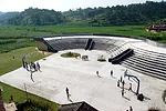 This school was one of the firm&rsquo;s earliest projects. Integrated into the surrounding landscape of farming terraces, it features a topography of steps connecting a basketball court to an open roo