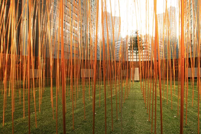 Mounted on the terrace of Hong Kong art space Spring Workshop, Industrial Forest alludes to the area's natural, industrial, and postindustrial heritage. Its metal 'bamboo' rods respond to the movement