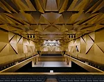 Occupying the site of a concert hall destroyed during World War II in this northwestern Polish city, the building's translucent glass form 'appears as a white mass in the daytime,' says Alberto Veiga,