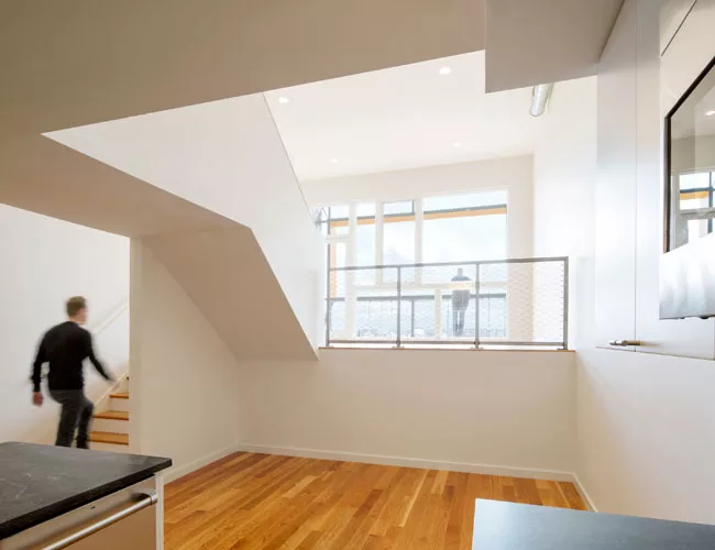 The building has nine one-bedroom units, all with waterfront views.