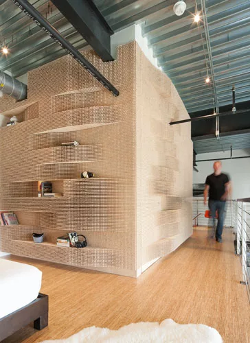 Merge’s interior projects often involve the repetition of simple objects. For an installation in a private loft, the firm created an undulating pegboard wall out of 42,000 wooden dowels. It was