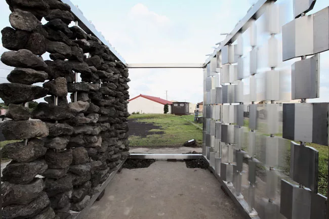 For a permanent installation on Jeju Island off the south tip of Korea, the architects collaborated with scientists at the Korea Institute of Energy Research, building a pair of facing walls—one