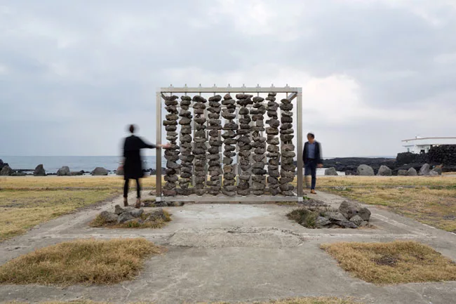 For a permanent installation on Jeju Island off the south tip of Korea, the architects collaborated with scientists at the Korea Institute of Energy Research, building a pair of facing walls—one
