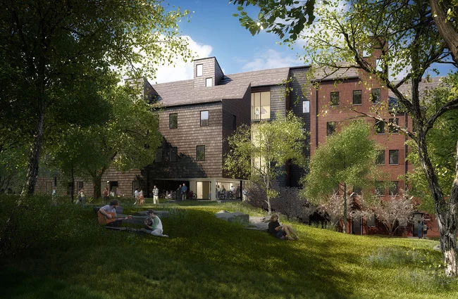 This graduate-student housing at Princeton University is comprised of townhouse and mid-rise apartments, common facilities, and parking. The 15 structures are arranged as a community within a communit