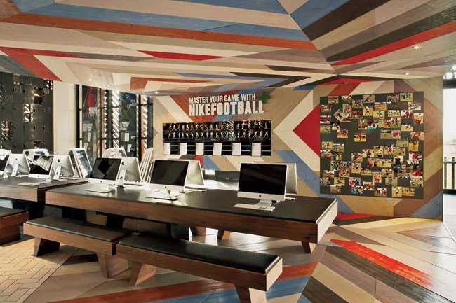Interiors blend commercial images from Nike with social spaces for players.