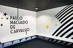 In a renovated structure behind the new building, RUFproject worked with the graphic design agency Grid Worldwide to stamp each dressing room with the logos and colors of famous football teams sponsor