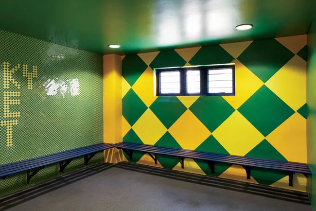 In a renovated structure behind the new building, RUFproject worked with the graphic design agency Grid Worldwide to stamp each dressing room with the logos and colors of famous football teams sponsor