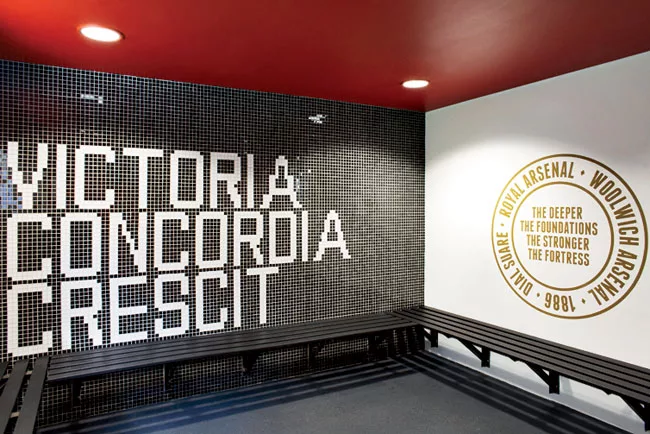 In a renovated structure behind the new building, RUFproject worked with the graphic design agency Grid Worldwide to stamp each dressing room with the logos and colors of famous football teams sponsor