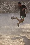 A boy practices his ball-handling skills. <em>January 2012</em>.