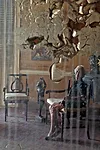 In a water-damaged mirror, a reflection of Madame Viviane Gauthier, a renowned 93-year-old dance instructor who resides in a historic gingerbread house in Port-au-Prince. <em>January 2012</em>.