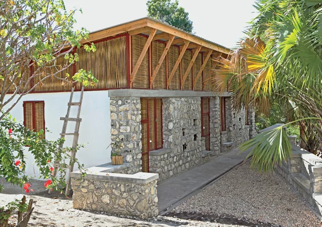 Stones used for the foundation walls and entrance facade were collected from a nearby riverbed.