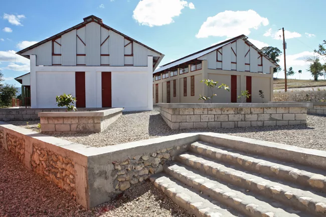 The campus features clusters of one- and two-classroom buildings.