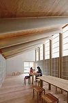 Outside, Ban added an atelier for children&rsquo;s art classes, largely funded by painter Hiroshi Senju of Kyoto University of Art and Design, as well as a community center.