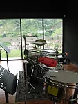 The music school looks down to the village below and the hills and highway beyond.