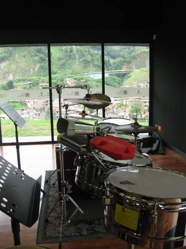 The music school looks down to the village below and the hills and highway beyond.
