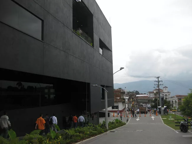 The plan maintains existing pedestrian paths through the village.