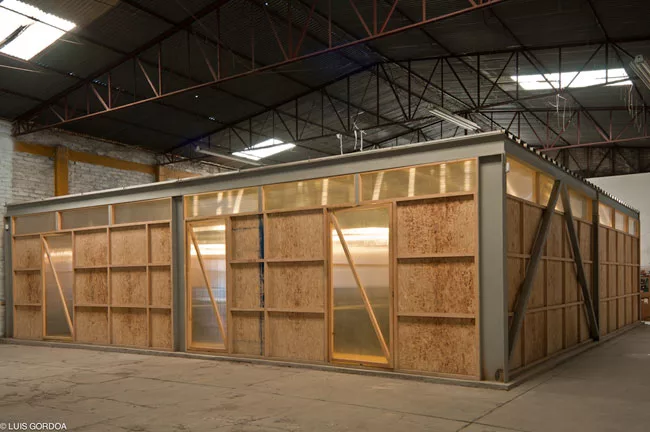 To create classrooms, information centers, and cafeterias, modular units are inserted into existing community centers.