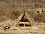 The school sits on a beachfront plot and is partially open toward the sea.