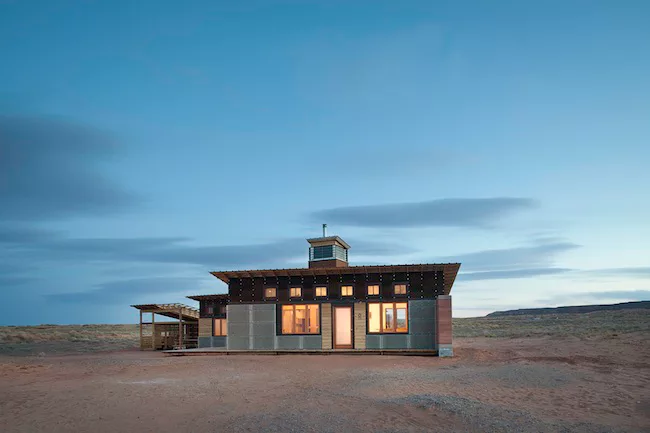 Handmade sliding clerestory windows and 10 recycled operable windows assist with natural ventilation. 
