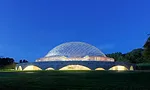 An R. Buckminster Fuller geodesic dome rises over a renovated and restored John Terence Kelly 1959 office building, home to ASM International, a member-led society for the materials science and engine